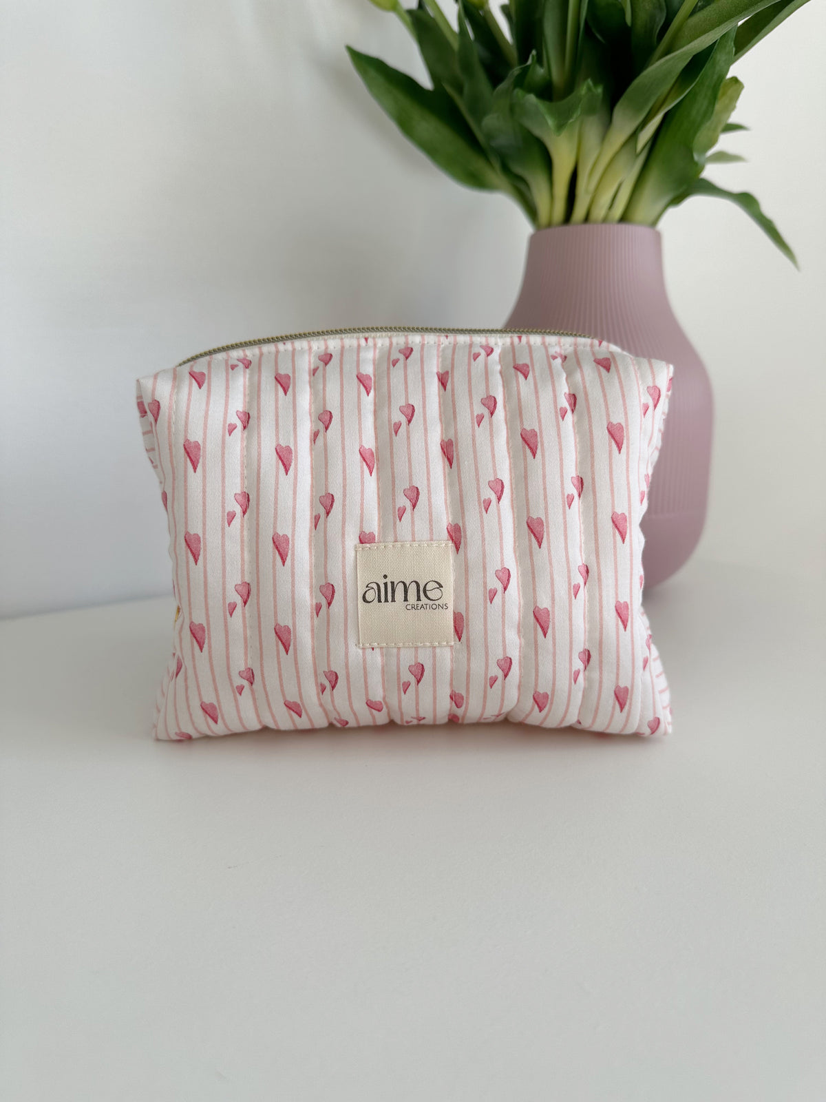 beauty case con cuoricini rosa