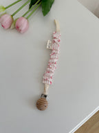 Clip porta ciuccio artigianale con fantasia a righe rosa e cuori