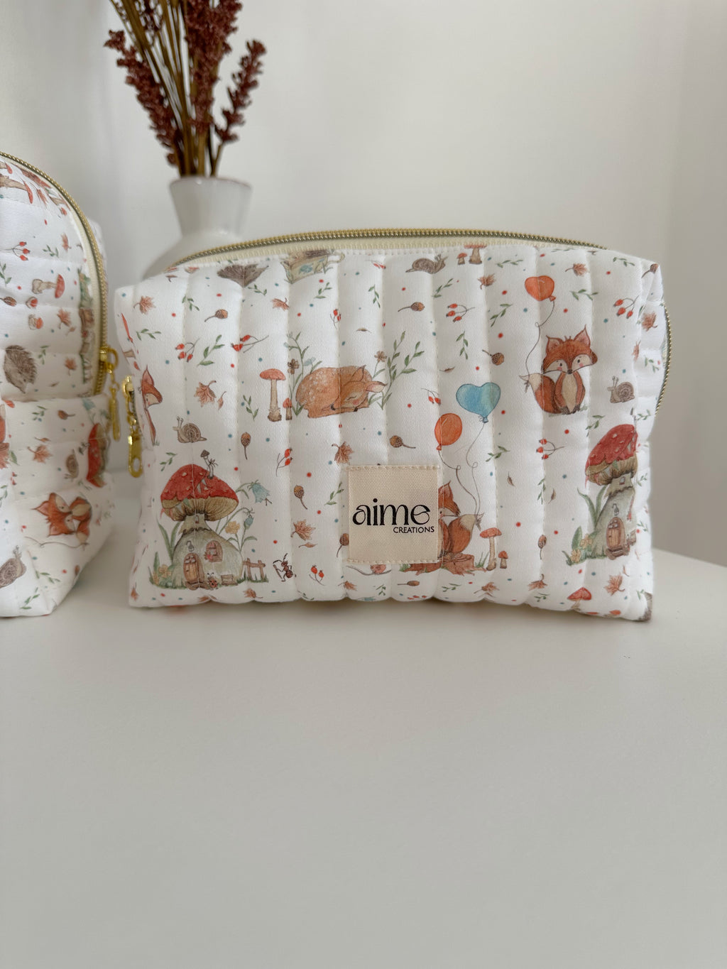 beauty case con dettagli di animaletti del bosco