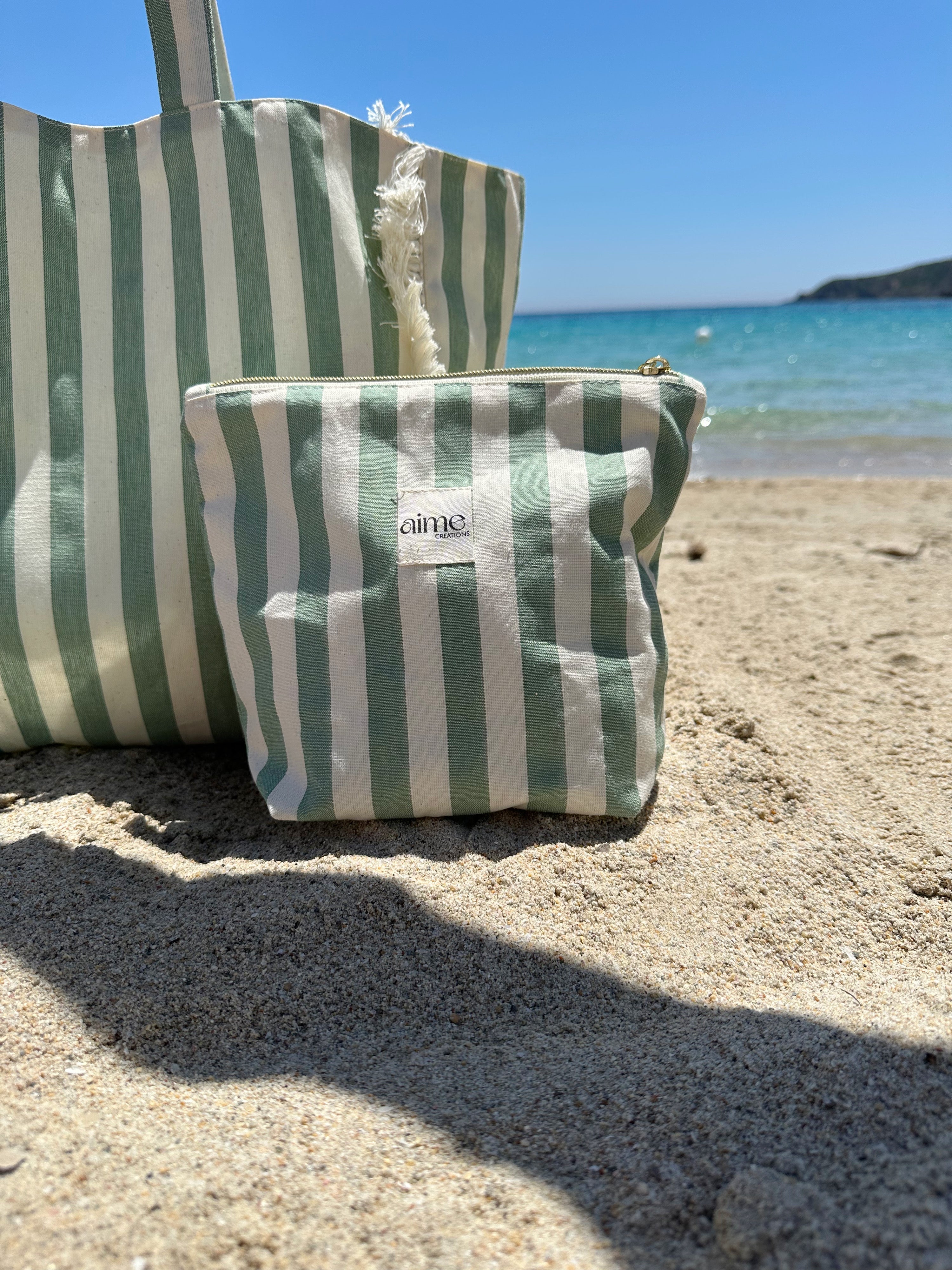 borsa mare e pochette a righe verdi