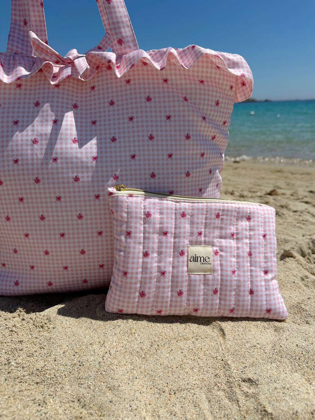 set borsa e pochette abbinata in vichy rosa e fiori 