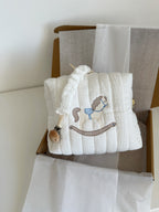 idea regalo nascita con beauty case e clip ciuccio artigianale e personalizzabile