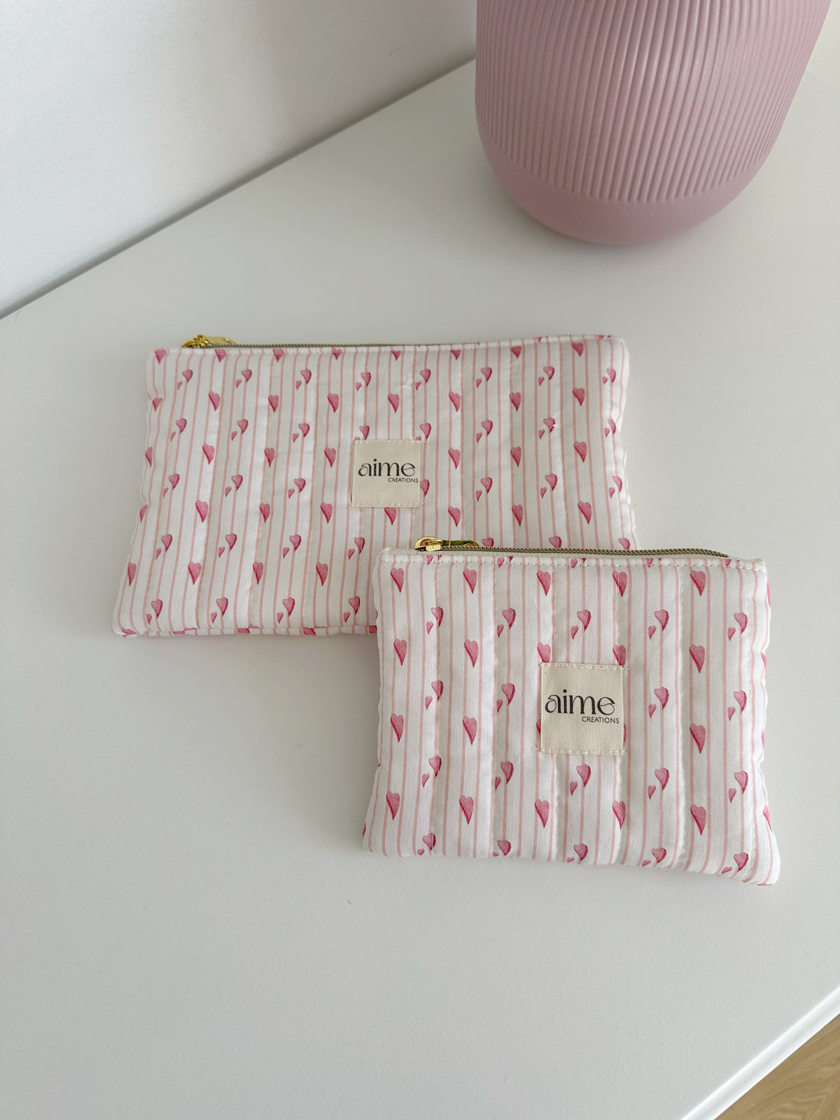 pochette rosa con cuori