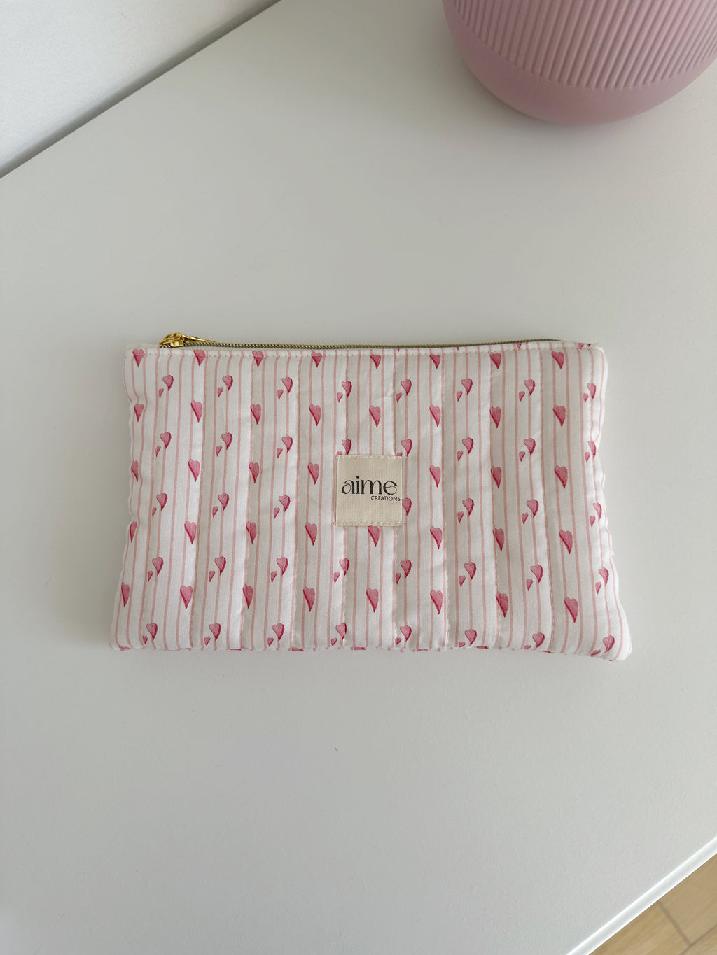 pochette artigianale rosa con cuori 