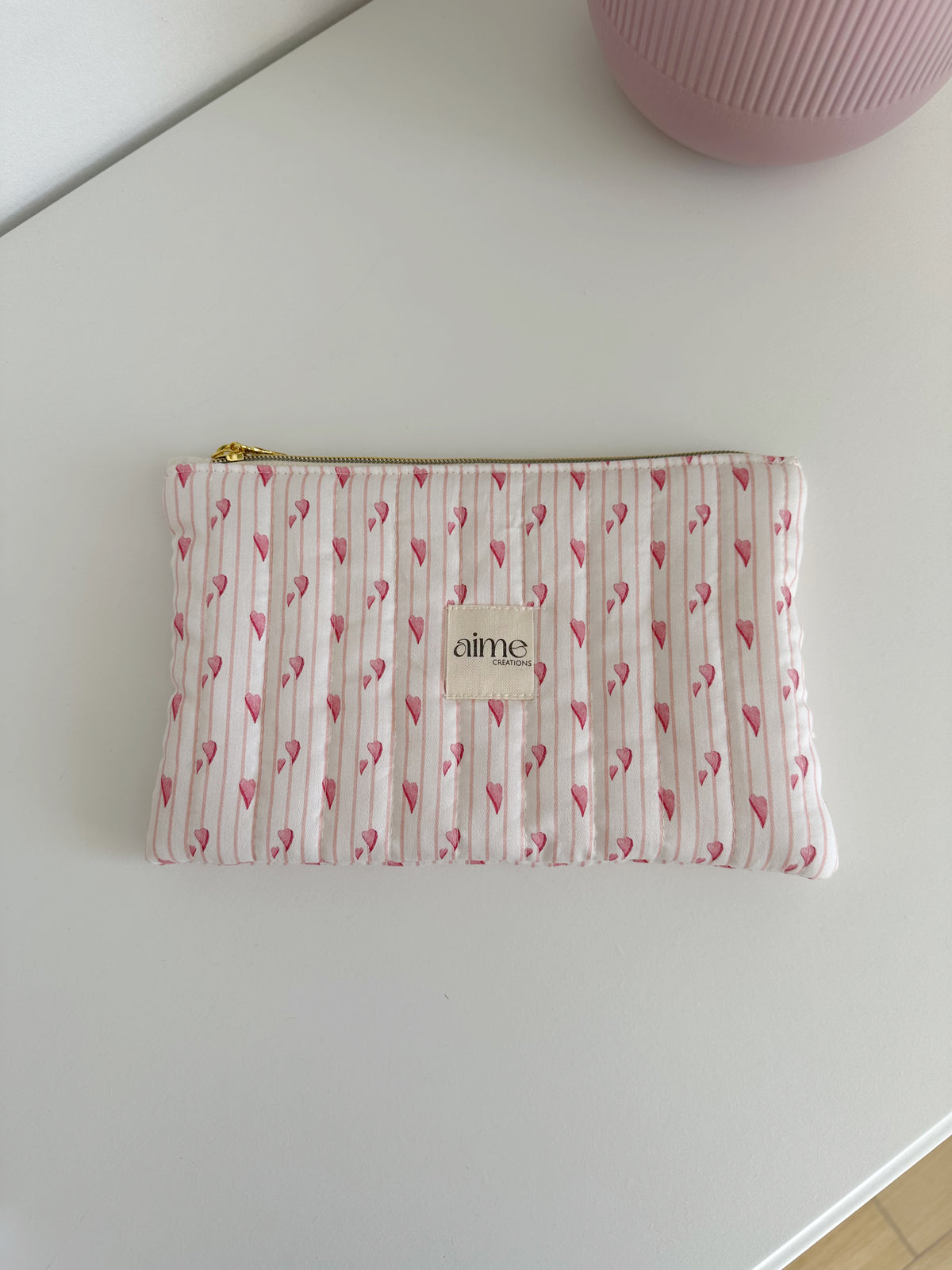 pochette artigianale rosa con cuori 
