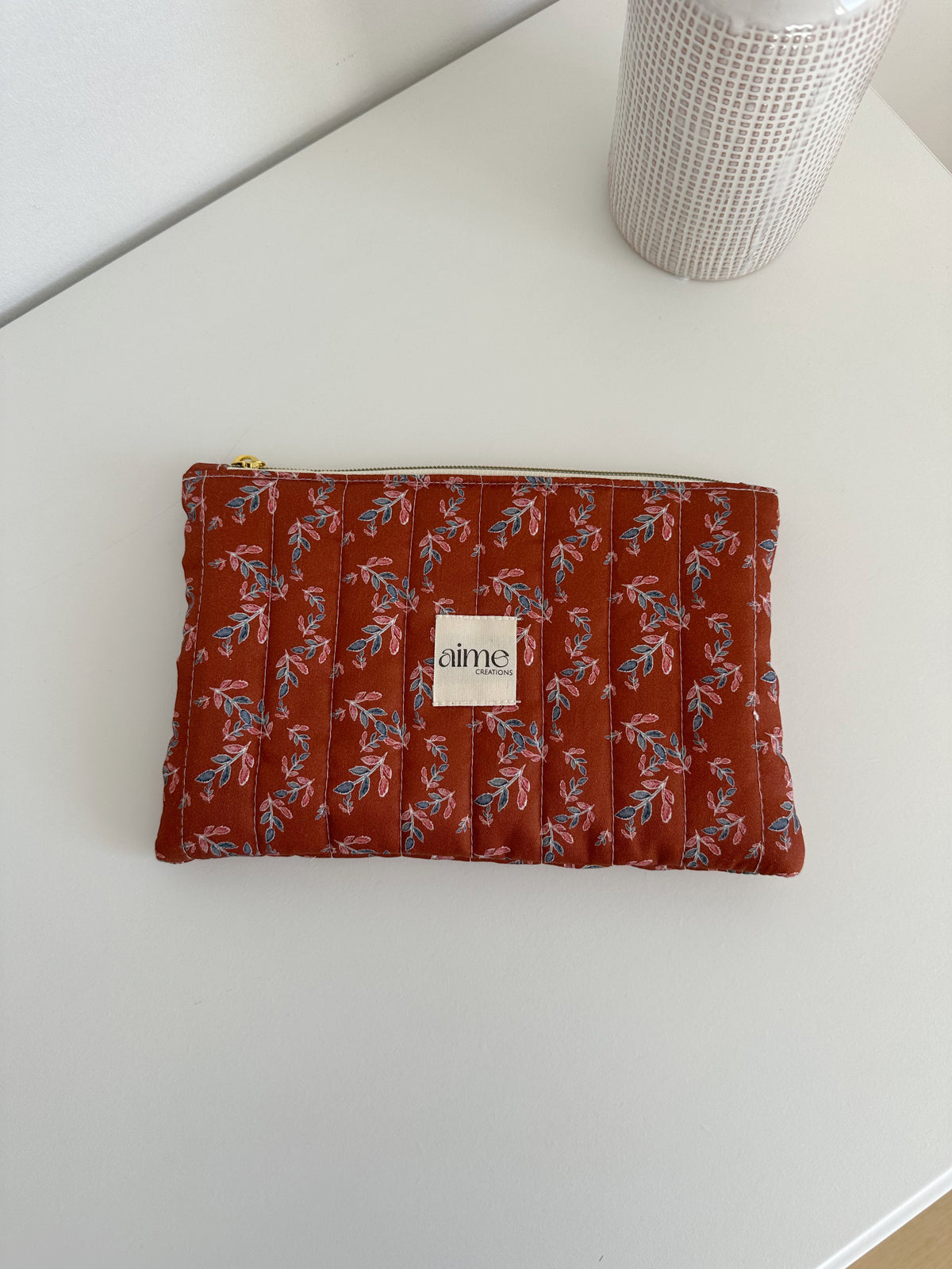 pochette personalizzabile terracotta con foglie 