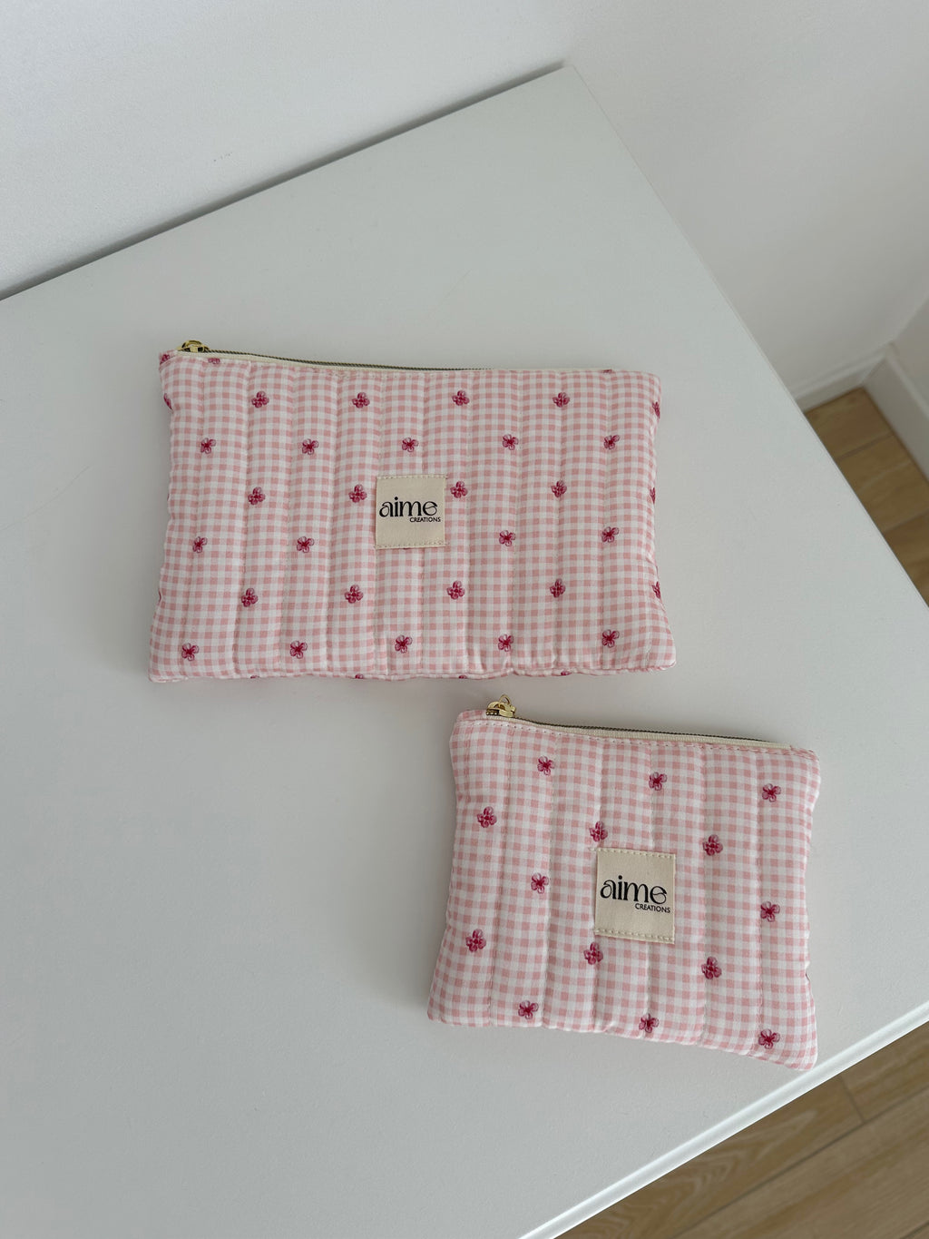 pochette a quadretti rosa con fiori