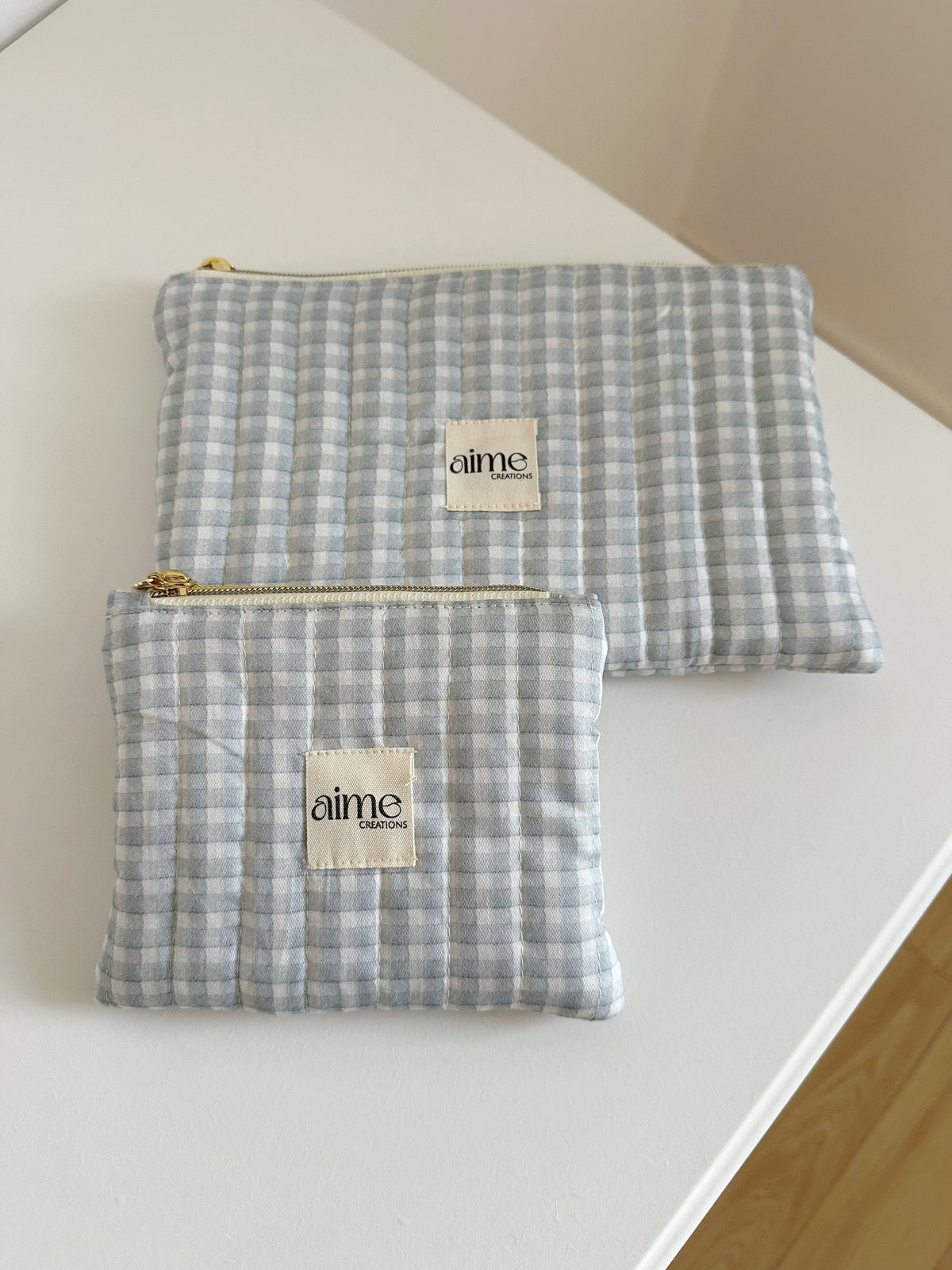 pochette artigianali a quadretto blu