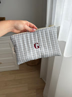 pochette a quadretto blu con ricamo
